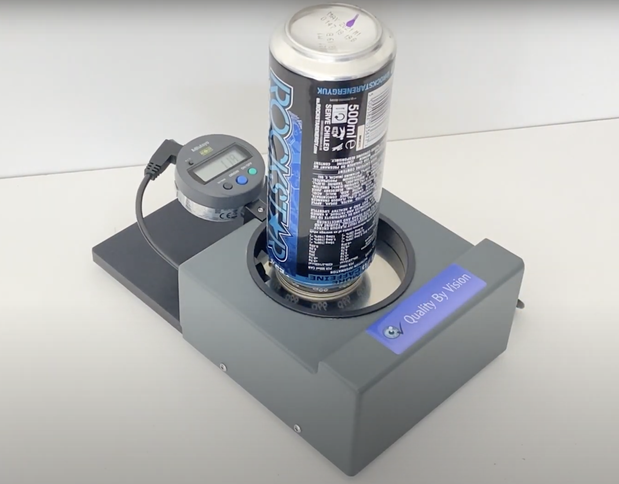Beverage seam thickness gauge measuring a can