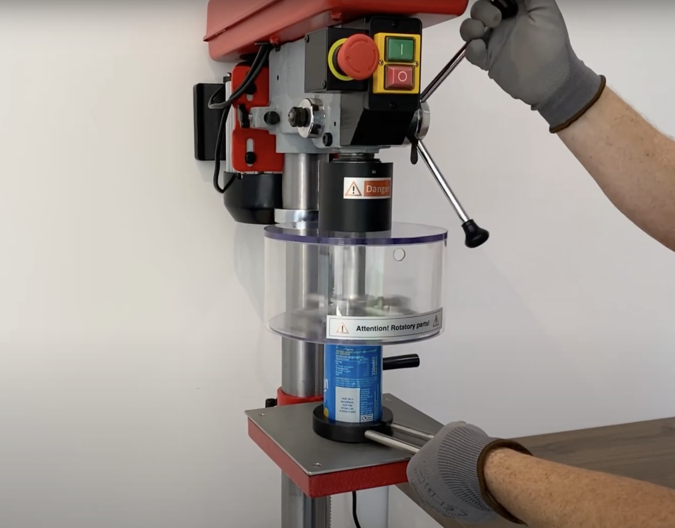 Seam stripper in use on a can